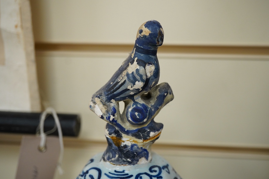An 18th century Delft vase and cover, 40cm